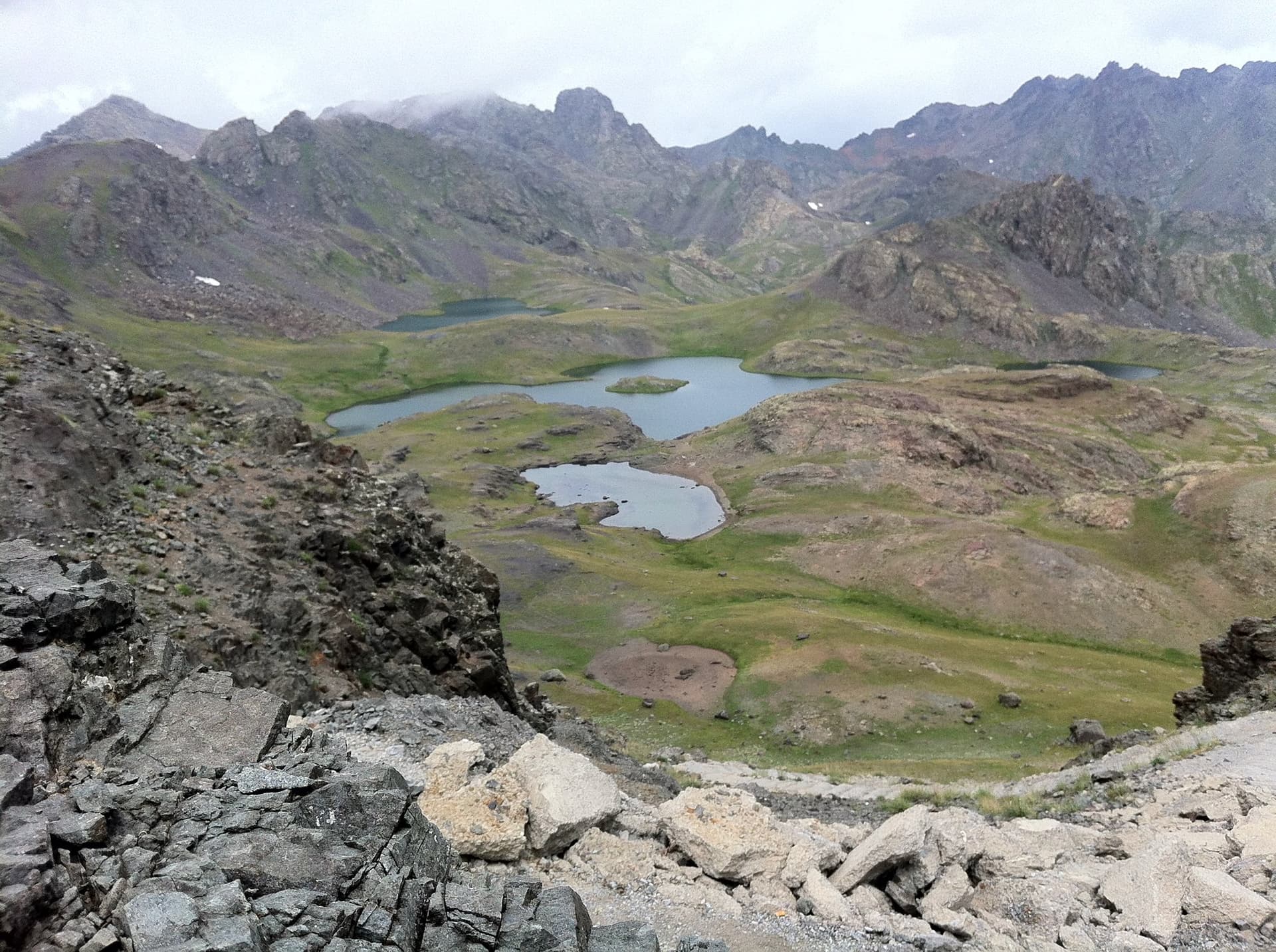 Small alpine tarns scattered across a rocky basin in the Kackar Mountains